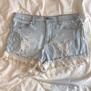 High waisted light wash shorts